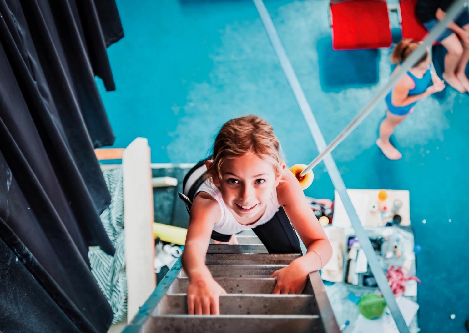 Child climbing ladder Circus Arts Byron Bay